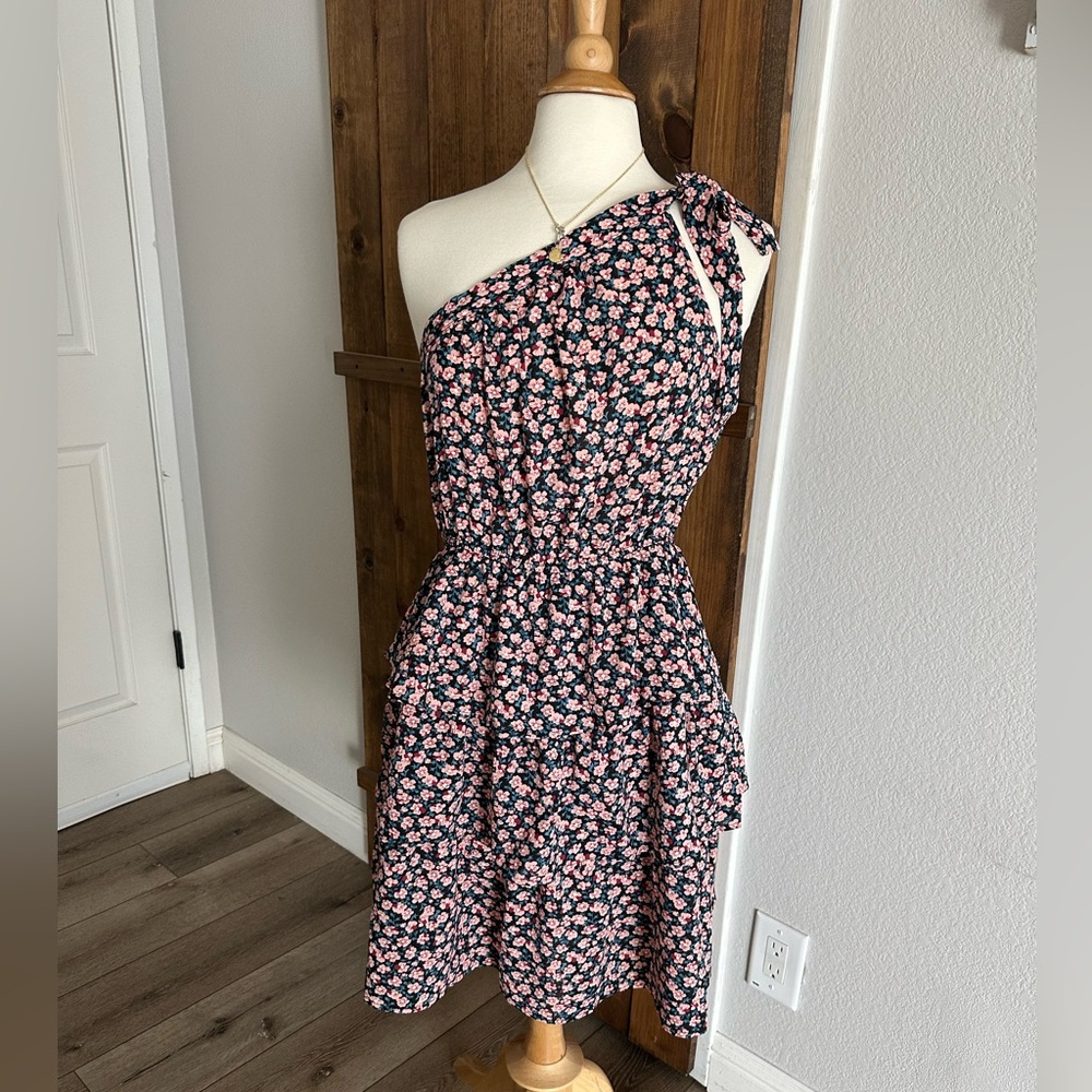 One shoulder floral dress with tie and ruffles. Size Large
